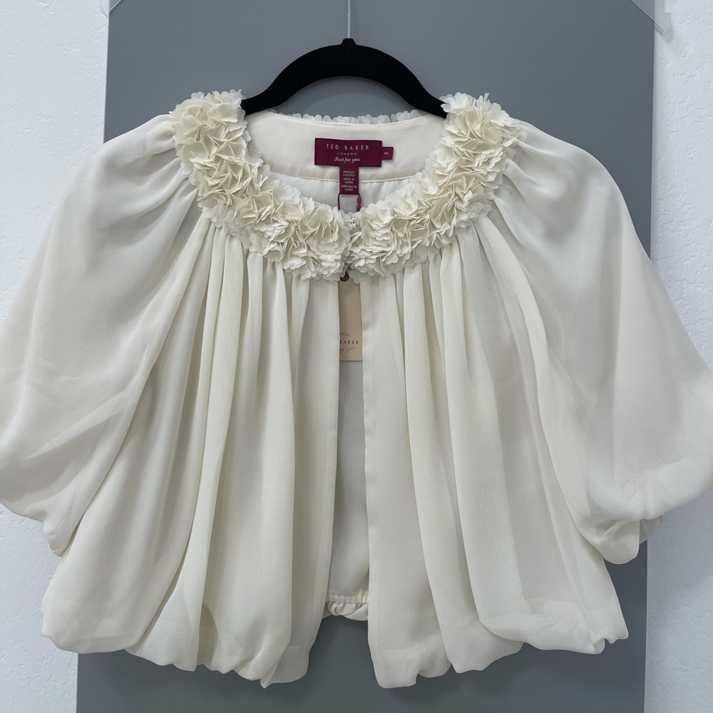 Flower cut detail shrug